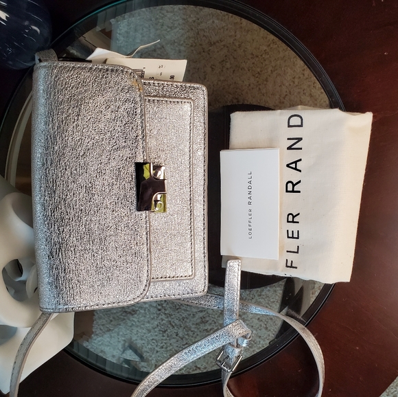 Loeffler Randall

Mini Minimal Rider Leather Cross - Picture 7 of 12